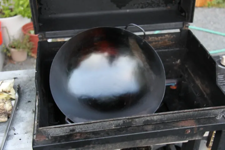 season wok in oven