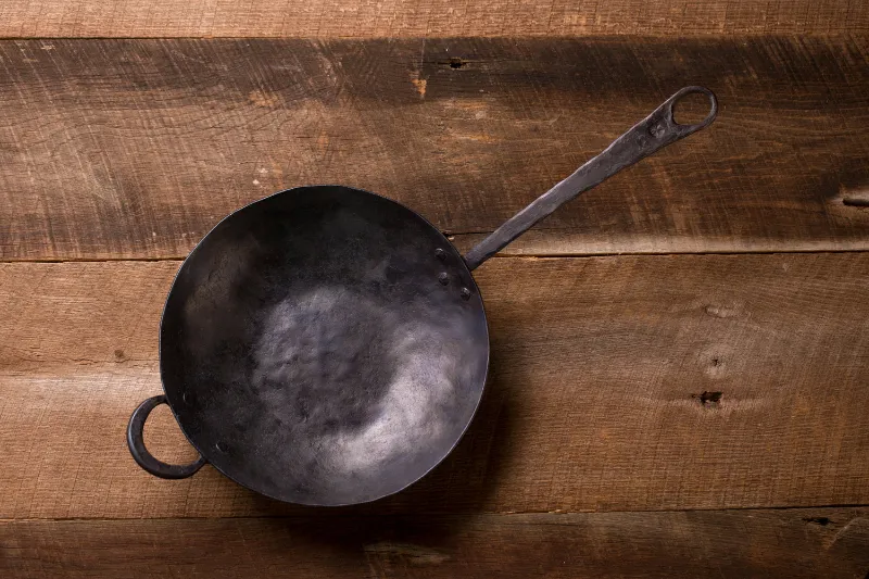 Carbon Steel Vs Cast Iron Wok